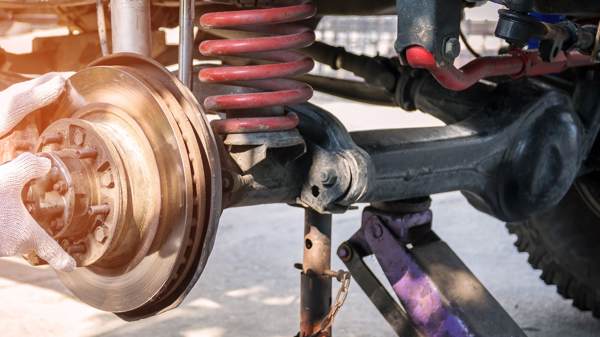 A close up of a vehicle's front suspension