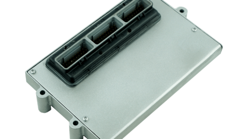 Silver metal electronic control box with black ventilated top panel